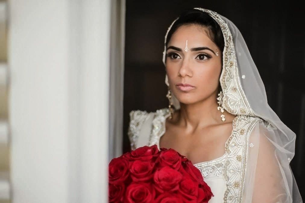 Bride with red roses