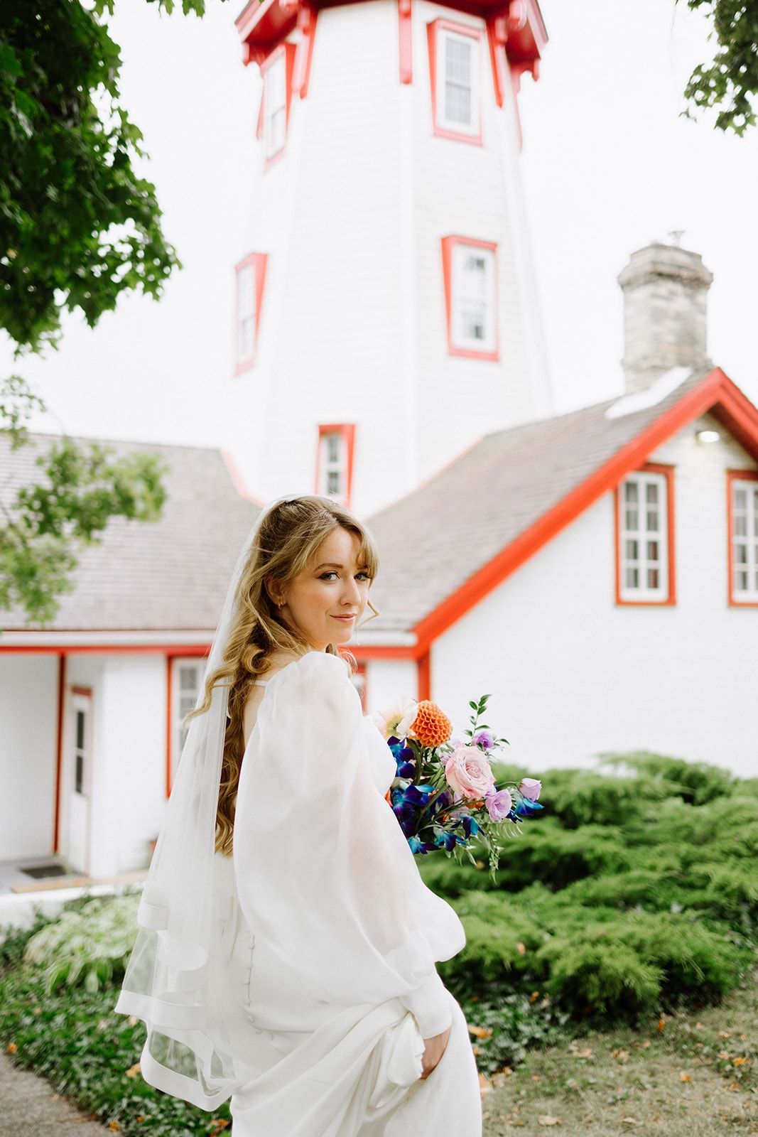 Bride outdoors with bouquet